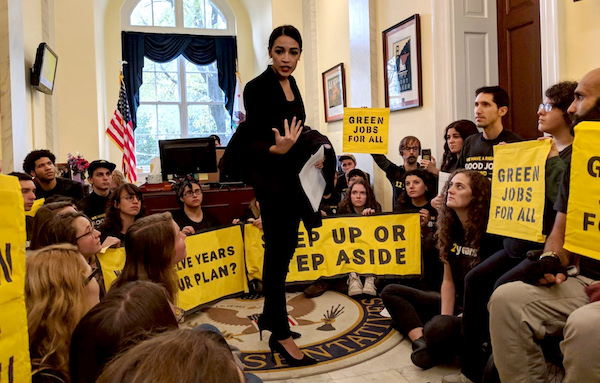 Alexandria Ocasio-Cortez with Sunrise Movement activists demanding a Green New Deal from Nancy Pelosi